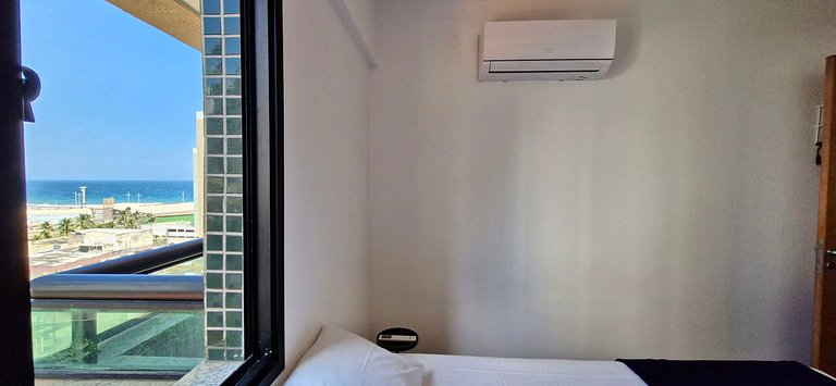 Quarto e sala com varanda em Armação - COARM0110