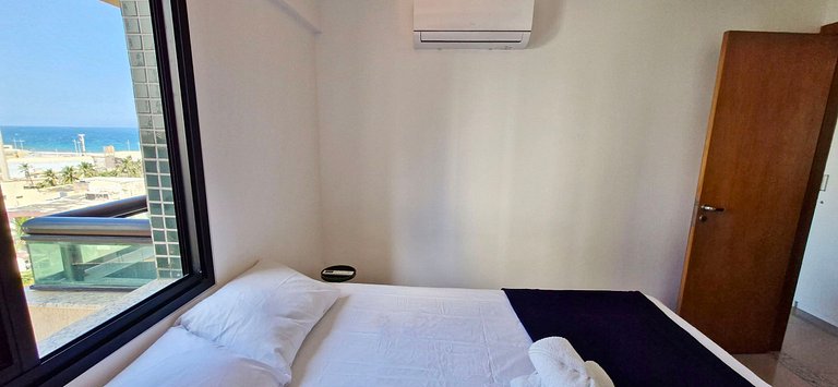 Quarto e sala com varanda em Armação - COARM0110