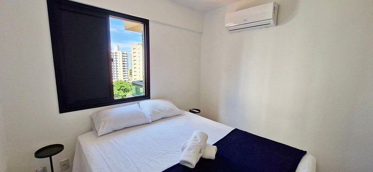 Quarto e sala com varanda em Armação - COARM0110